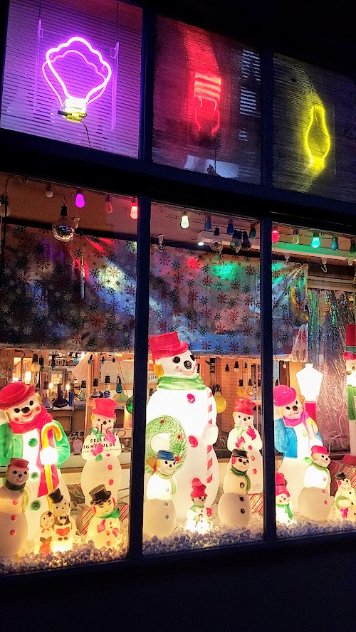 Snowman vs Santa - are you #TeamSnowman or #TeamSanta #illuminatedpdxmas2017 at the All American Holiday Window Display