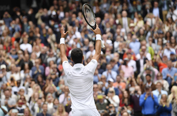 Serbia'a Novak Djokovic celebrates winning his first round match against South Africa's Kevin Anderson at Wimbledon in London, Britain, on June 30 2021. Picture: REUTERS/TOBY MELVILLE