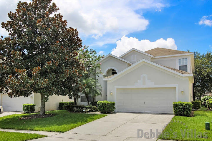 Orlando villa, near Disney, games room, cinema room, south-facing pool, gated Kissimmee resort