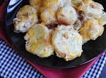 Dutch Oven Cheesy Potatoes was pinched from <a href="http://jamiecooksitup.net/home/" target="_blank">jamiecooksitup.net.</a>