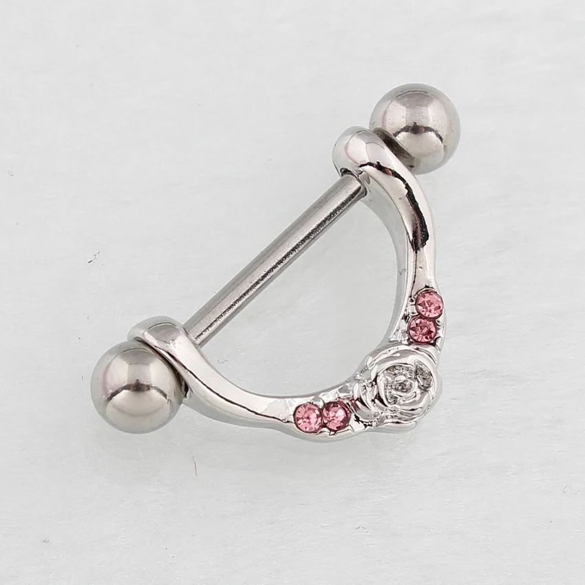 Anneau de téton en forme de U avec diamant rose, piercing corporel, accessoire de bijouterie pour orner et sublimer le corps féminin.