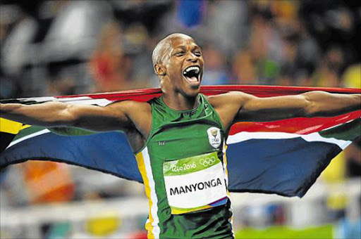 FLYING HIGH: South Africa’s Luvo Manyonga celebrates winning silver after the men’s long-jump final at the 2016 Olympic Games in Rio de Janeiro on Saturday Picture: GETTY IMAGES