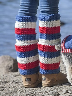 woman wearing UGG boots, jeans and a pair of red, white and blue leg warmers