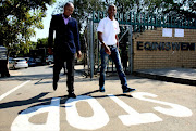 FILE PICTURE: May 03, 2017. Pastor Mtho beli Ndleleni from Will fo God Ministries International and social entrepreneur Vuyo Sibiya on the left of Kuzondlula Motivational Tour walk out of Eqinisweni Secondary School in Ivory Park, Midrand, after their event was stopped by authorities. Photo Sandile Ndlovu. © Sowetan