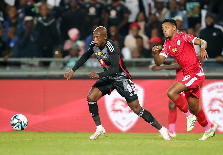 Zakhele Lepasa of Orlando Pirates challenged by Jamie Webber of Sekhukhune United during the 2023 MTN8 quarterfinal match at the Orlando Stadium, Soweto on the 12 August 2023.