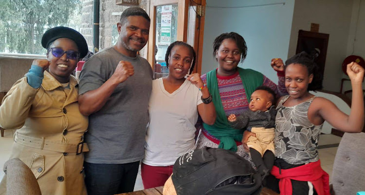 Haki Africa executive director Hussein Khalid with a number of the 35 Saba Saba protesters after their release from the Central Police Station on Sunday, July 9, 2023.