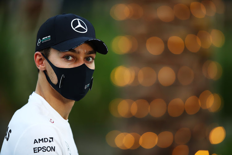 George Russell of Great Britain and Mercedes GP looks on in the paddock during previews before the F1 Grand Prix of Sakhir at Bahrain International Circuit on December 3 2020 in Bahrain.