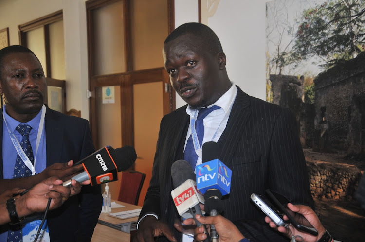 International Justice Mission senior manager Aggrey Juma addresses journalists at Pride Inn hotel in Mombasa