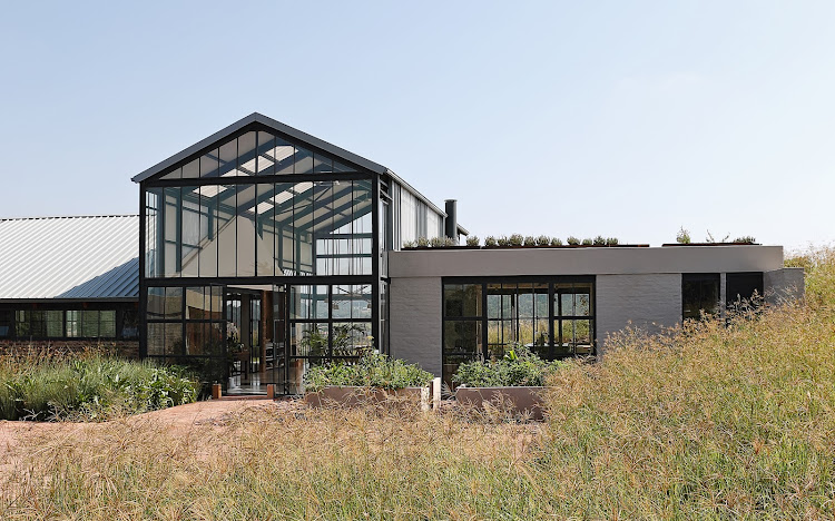 The barn-like shape of this Pretoria home has its origins in the desire for simplicity – quality of space was paramount, while appearance and style were secondary concerns.