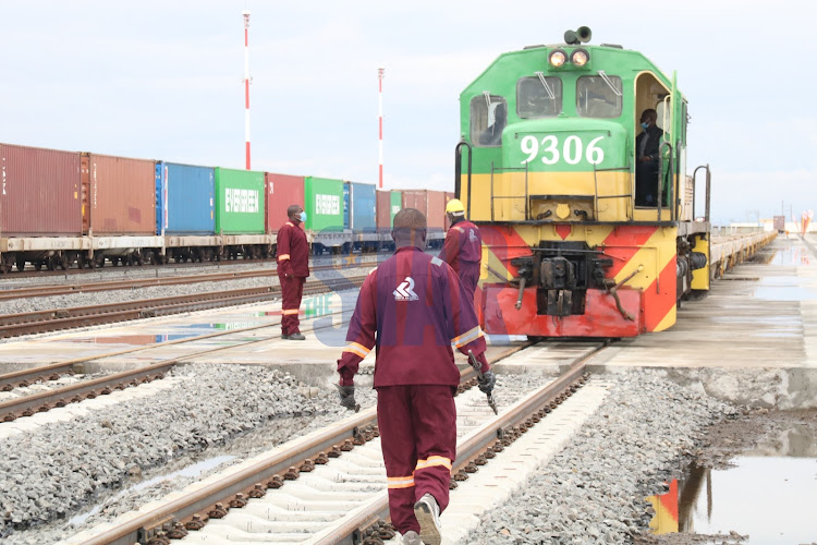 Kenya Railways staffers control operations at Naivasha Inland Container Depot on Monday 17, January. The new Naivasha SGR-MGR link cuts Kenya-Uganda Distance by 2 days.