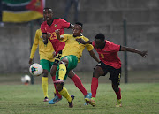 Selaelo Rasebotja of South Africa challenges Melito Alexandre of Mozambique  during the 2022 Cosafa Cup Quarter Final match between South Africa and Mozambique.