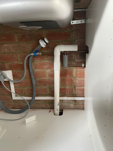 Old pipework under sink 