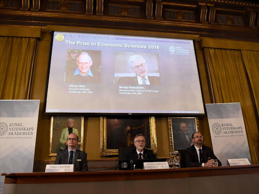 Tomas Sjostrom, member of the Committee for the Prize in Economic Sciences in Memory of Alfred Nobel, Goran K. Hansson, Secretary General of the Royal Swedish Academy of Sciences and Per Stromberg, Chairman of of the Committee for the Prize in Economic Sciences in Memory of Alfred Nobel, during a news conference presenting the laureates for the Sveriges Riksbank Prize in Economic Sciences in Memory of Alfred Nobel 2016: Oliver Hart and Bengt Holmstrom, in Stockholm, Sweden, October 10, 2016. /REUTERS