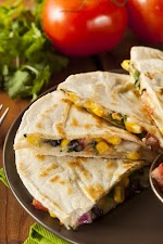 Veggie Quesadilla (Makes 2-4 Servings) was pinched from <a href="http://12tomatoes.com/2014/10/mexicaninspired-recipe-corn-and-bean-veggie-quesadilla.html" target="_blank">12tomatoes.com.</a>