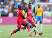 Hlompho Kekana of Mamelodi Sundowns challenged by Ben Motshwari of Orlando Pirates during the Absa Premiership 2018/19 match between Mamelodi Sundowns and Orlando Pirates at the Loftus Versveld Stadium, Pretoria on 10 November 2018.