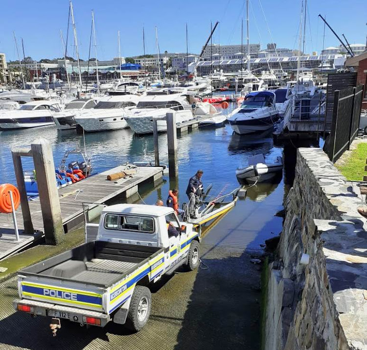 One of the alleged poachers' boats is pulled out of the water at Cape Town harbour on February 27 2020.