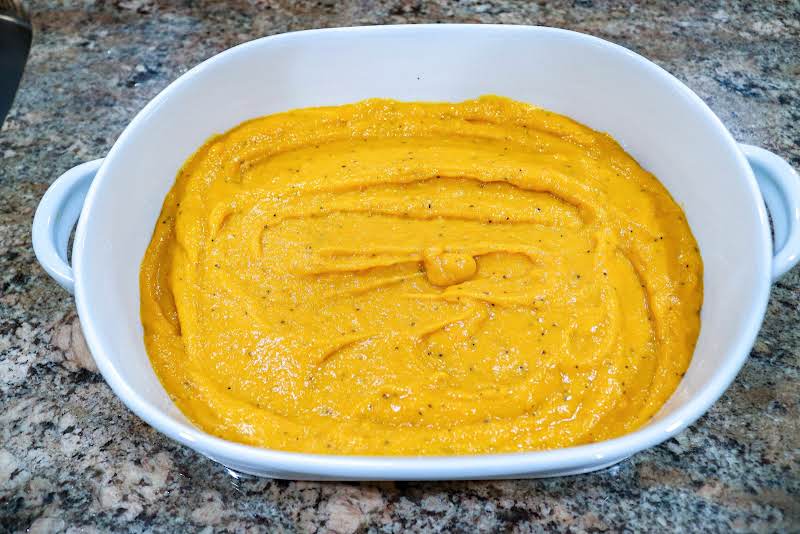 Sweet Potatoes Poured Into A Baking Dish.