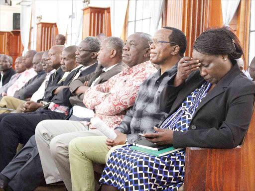 Former PS Lillian Omollo (right) and some of her co-accused in a Milimani court on January 14 /COLLINS KWEYU