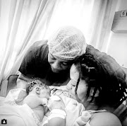 Letoya Makhene and partner Tshepo Leeuw with the latest addition to their family, Kopano Jordan Leeuw. / Instagram