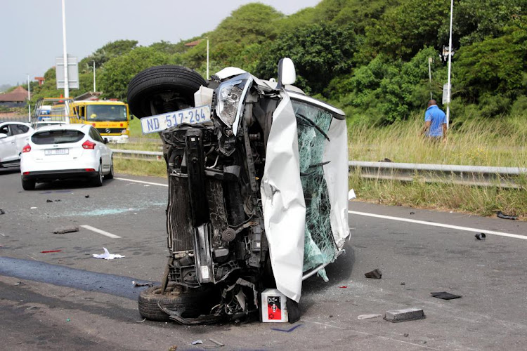 An overturned car on Durban's M41.