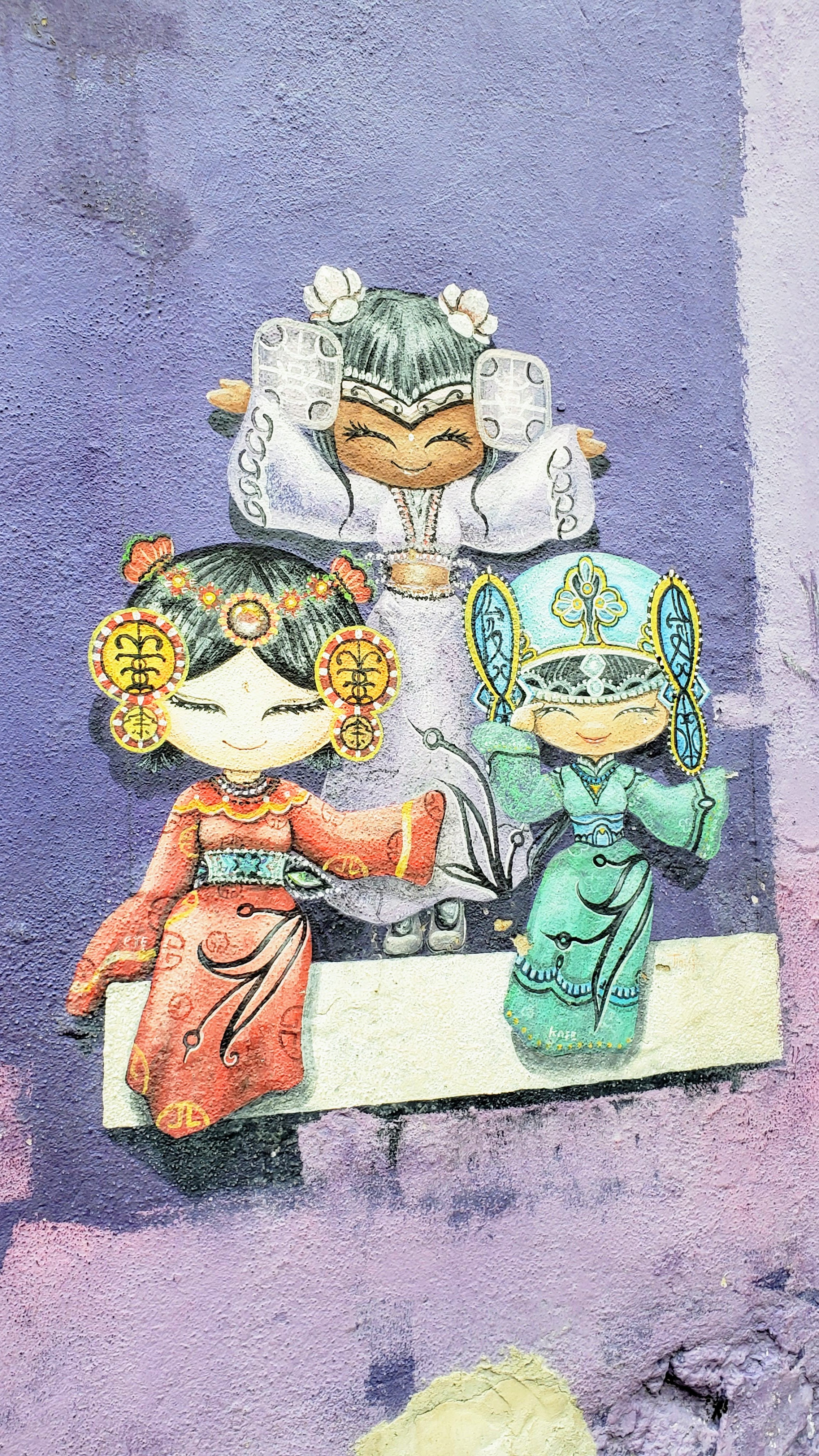 Tips on visiting George Town Street Art: Georgetown wall art Wo Ai Nee Chinese Malay Indian, or the Cultural Girls Georgetown wall painting is a tiny wall mural in Penang Armenian Street from 2013. The mural portrays three girls of three different races living in harmony in Georgetown: A Chinese, a Malay, and an Indian. and Wo Ai Nee Chinese Malay Indian, literally means ‘I love you Chinese, Malay and Indian‘