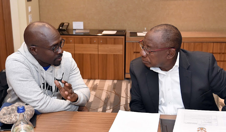 FILE PHOTO: President Cyril Ramaphosa with Finance Minister Malusi Gigaba at a WEF meeting in Davos, Switzerland, in 2018.