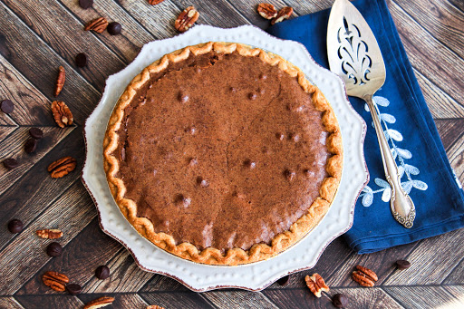 Chocolate Brownie Pecan Pie ready to be sliced.