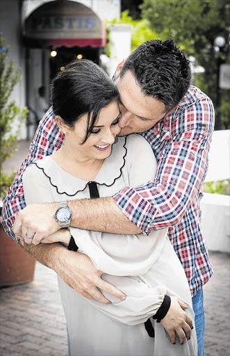 STUMPED: Former Proteas captain Graeme Smith and wife Morgan Deane pose for You magazine. File photo