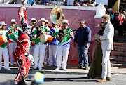 Cape minstrels entertain the Duke and Duchess of Sussex in Cape Town's Bo-Kaap on September 24 2019.