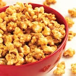 Peanut Butter Glazed Popcorn was pinched from <a href="http://www.jif.com/Recipes/Details/427" target="_blank">www.jif.com.</a>