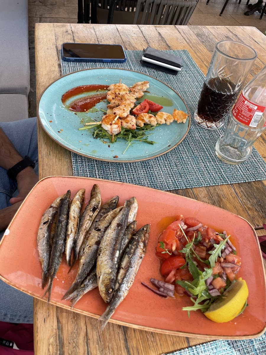Grilled sardines and shrimp skewer