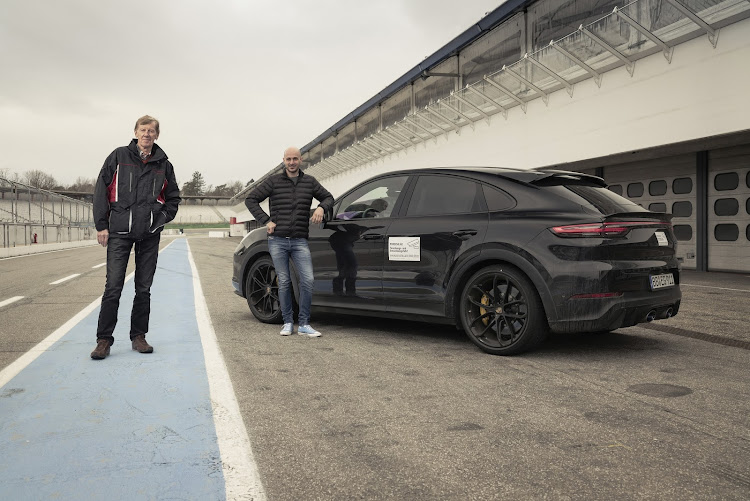 Porsche ambassador Walter Roehrl, left, and test driver Lars Kern have been putting final touches to the sporting new model. Picture: SUPPLIED