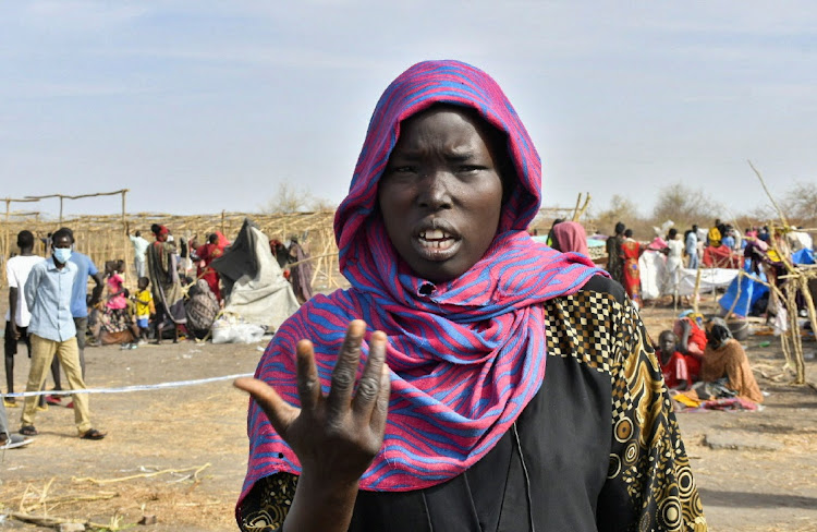 Lina Mijok, 26, a South Sudanese returnee who fled the war-torn Sudan following the outbreak of fighting between the Sudanese army and the paramilitary Rapid Support Forces (RSF) talks during a Reuters interview at the United Nations High Commissioner for Refugees (UNHCR) transit centre in Renk, near the border crossing point in Renk County of Upper Nile State, South Sudan May 1, 2023.