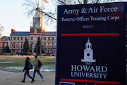 Students walk on the campus of Howard University, one of six historically Black colleges and universities (HBCUs) across the United States that received bomb threats, in Washington, U.S. January 31, 2022.    