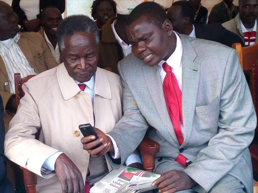 William Biwott(l) William Chepkut (R) in a past function at Ainabkoi Photo/File