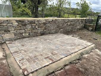 Dry stone wall and brick patio album cover