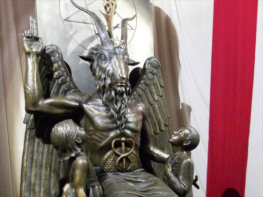 A one-ton, 7-foot (2.13-m) bronze statue of Baphomet -- a goat-headed winged deity that has been associated with satanism and the occult -- is displayed by the Satanic Temple during its opening in Salem, Massachusetts, US September 22, 2016 /REUTERS