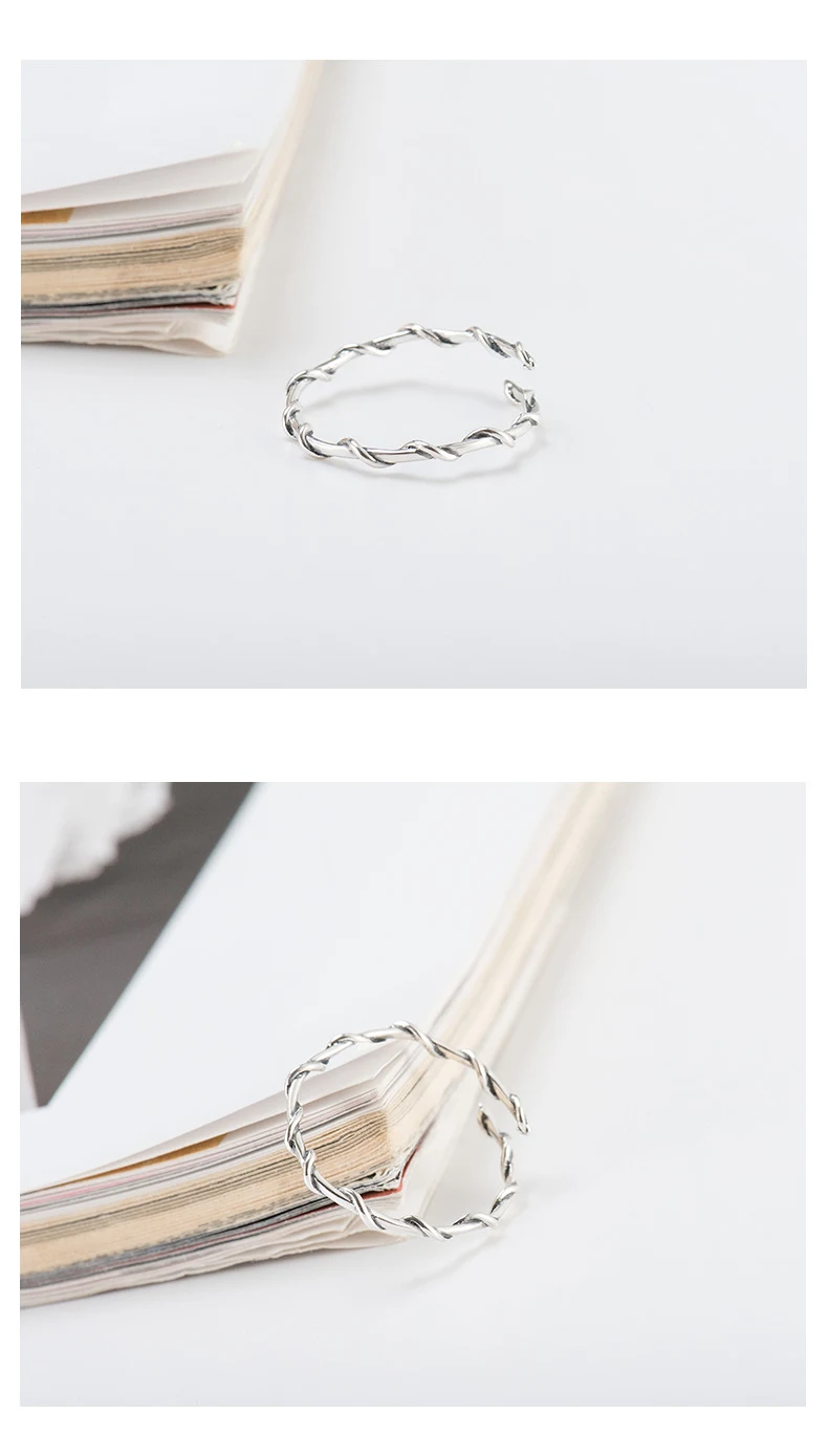 Title 1, Anello sottile in argento sterling con motivo r...