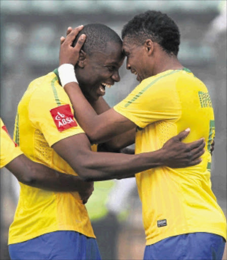 KILLER TOUCH: Katlego Mphela, right, and Sundowns teammate Nyasha Mushekwi celebrate Mphela's goal against Leopards during their league match at Lucas Moripe Stadium in Atteridgeville, Pretoria. Photo: Antonio Muchave