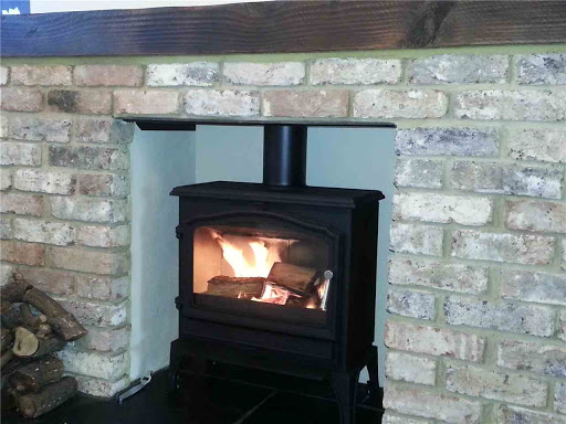 Esse 100 into brick fireplace opening, Sunbury on Thames