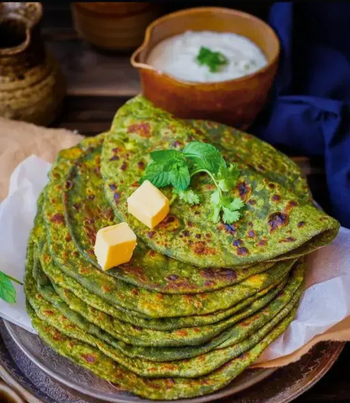 2 Palak Paneer Loaded Paratha With Butter Topping