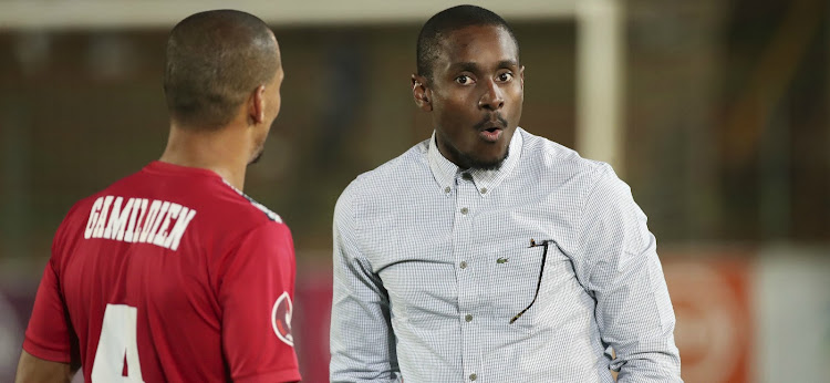 Chippa United coach Rulani Mokwena orders instructions to midfielder Ruzaigh Gamildien during an Absa Premiership on March 7 2020.