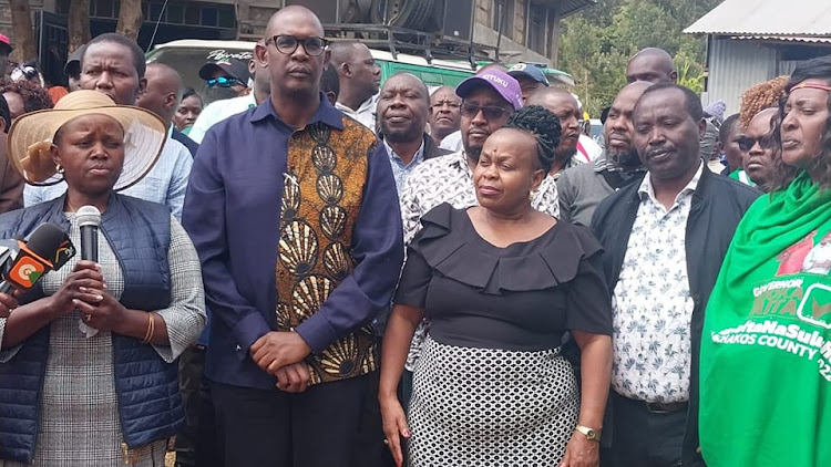 CCU Machakos governor candidate Nzioka Waita with Rose Wambua at Mbondoni Catholic Church in Kangundo subcounty on Sunday, July 24.