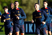 Portugal superstar Cristiano Ronaldo with Diogo Dalot during their national team training session at Cidade do Futebol FPF on March 21, 2023 in Oeiras, Portugal.