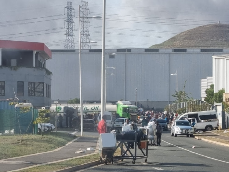 The photo of a petrol tanker stolen by looters was one of the first to emerge when unrest broke out in Durban last July. The tanker was taken from the Samuels Group in Cornubia.