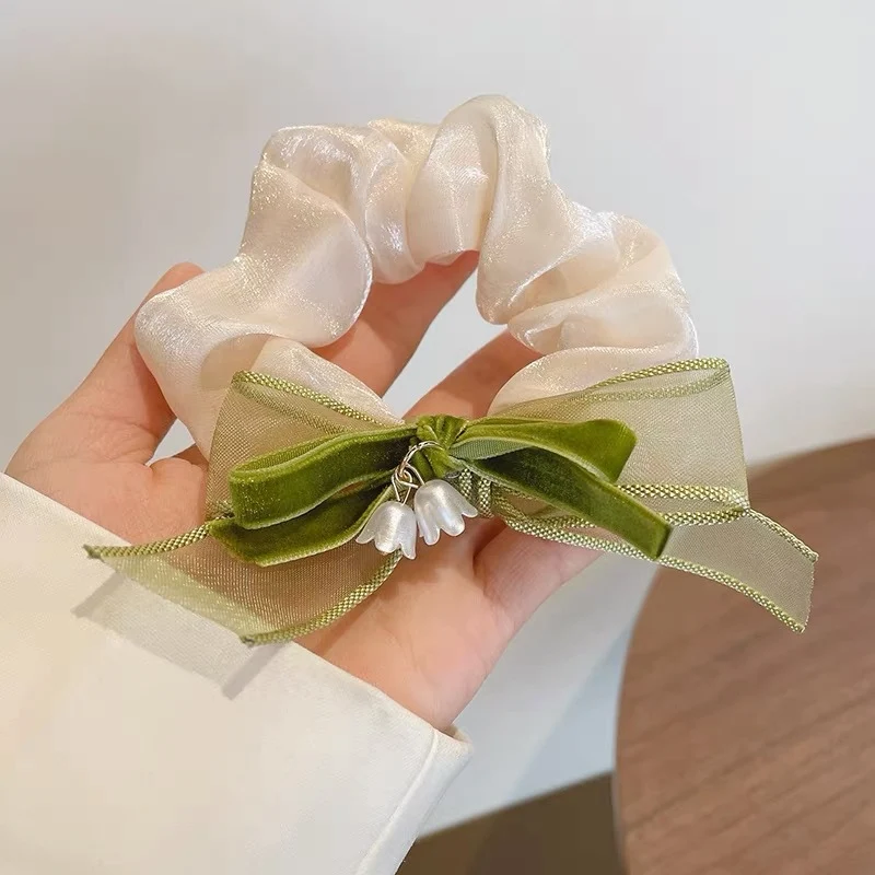 Sommer Super Fairy Süßes Spitzen Haargummi, ideal für große Haare. Zaubert sanfte, elegante Frisuren und schont das Haar.