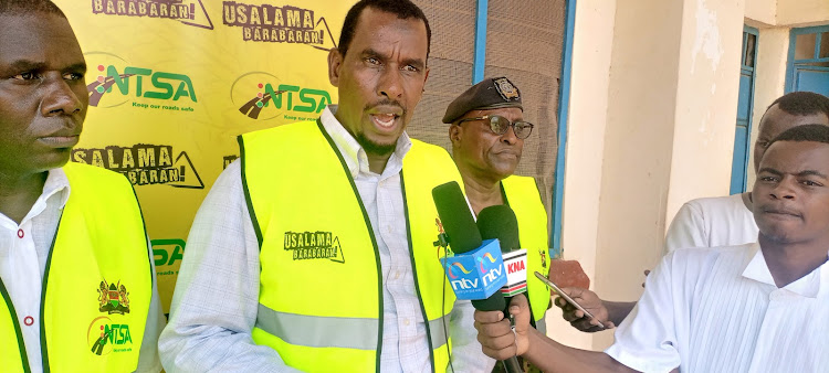 NTSA chairman Aden Ali speaking to the press at the Northeastern polytechnic in Garissa.