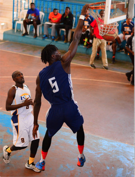 KPA's Ariel Okall dunks against KCA during a recent KBF league match at Nyayo Stadium