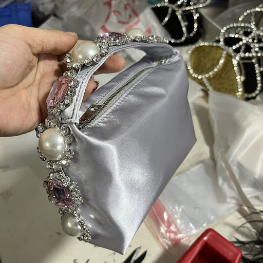 Title 5, Handbag Pearl Satin Bread With Diamonds, a luxu...