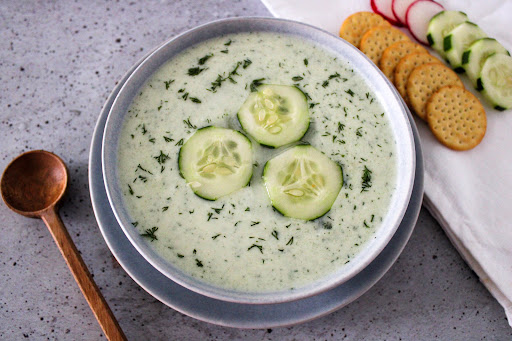 A bowl of Cool Iced Cucumber Soup ready to serve.